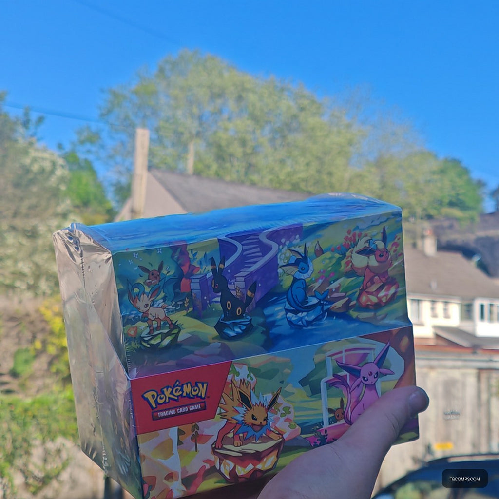 Prismatic Evolutions Mini Tin