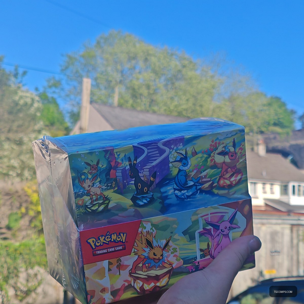 Prismatic Evolutions Mini Tin